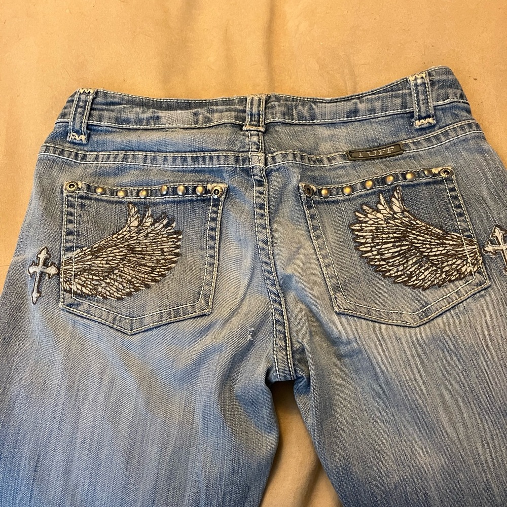 Cowgirl Tuff jeans size 28 inseam is 36 or 37